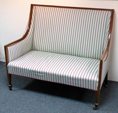 Lot 495 - A Sheraton revival two-seat settee, the frame...