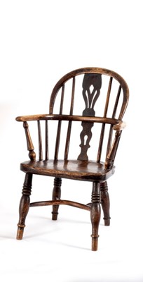 Lot 498 - A child's Windsor type armchair by Elizabeth...
