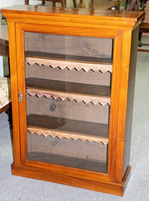 Lot 512 - A Victorian walnut pier cabinet enclosed by a...