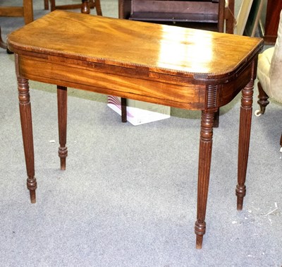 Lot 515 - A Regency mahogany card table, the fold over...
