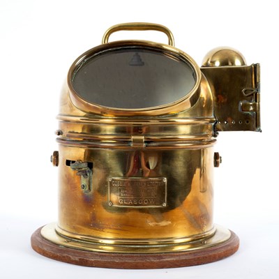 Lot 920 - A brass cased ship's binnacle containing a...