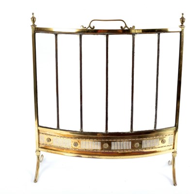 Lot 921 - A brass and glass fire screen on splay feet,...