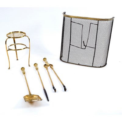 Lot 924 - A George IV brass and mesh fender, circa 1825,...