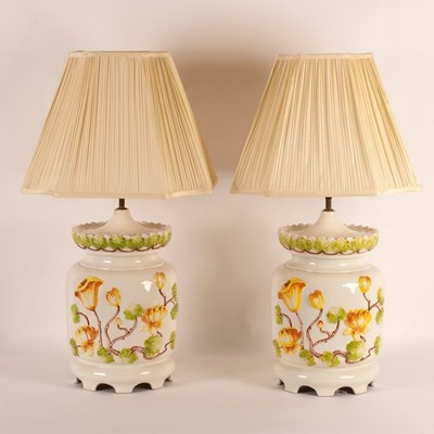 Lot 942 - A pair of large pottery table lamps decorated...