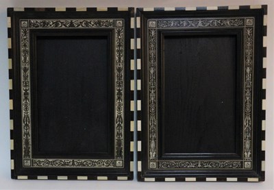 Lot 953 - A pair of early 20th Century ivory inlaid...