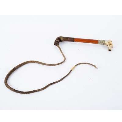 Lot 970 - A beagling whip, the carved bone handle of...