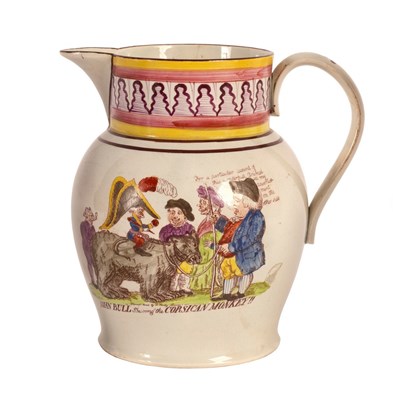 Lot 988 - A pearlware jug depicting John Bull shewing...