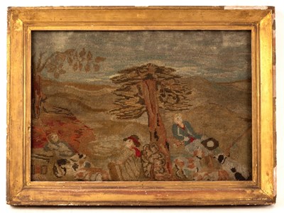 Lot 1024 - A needlework picture of shepherds with their...