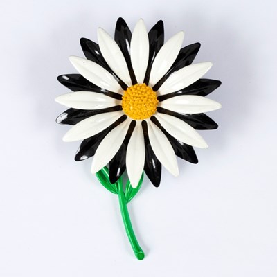 Lot 6 - A 1960s style enamelled brooch in the form of...