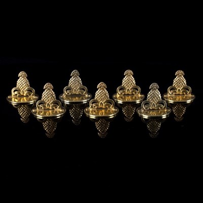 Lot 23 - Tiffany & Co, a set of seven silver gilt menu...