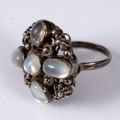Lot 30 - Style of George Jensen, a silver and moonstone...