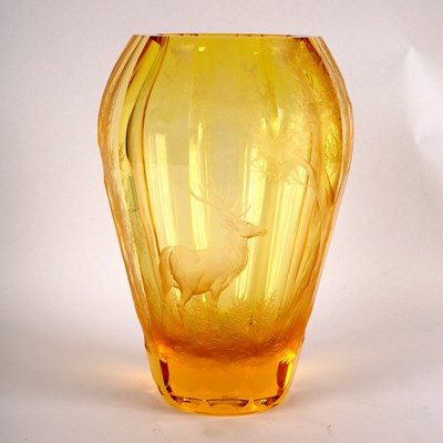 Lot 49 - Moser, an amber glass vase, engraved a stag...