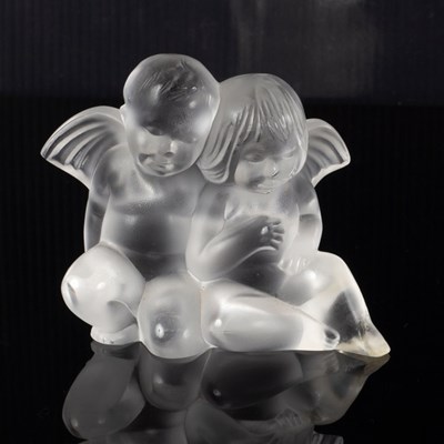 Lot 52 - Lalique, a modern frosted glass cherub group,...