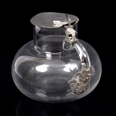 Lot 58 - An Italian silver mounted jug, the jug of...