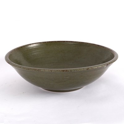 Lot 135 - A Studio Pottery bowl with dark green glaze...