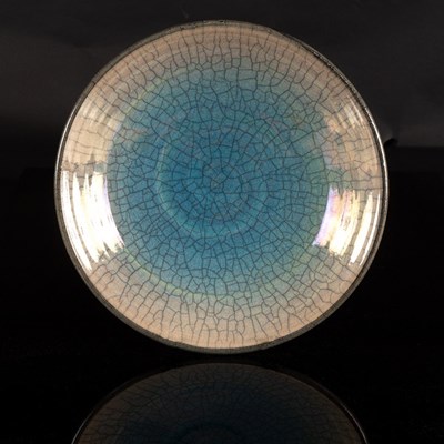 Lot 148 - John Dunn (born 1944), a raku pottery shallow...