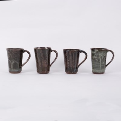 Lot 221 - Ladi Kwali (c.1925-1984), four stoneware mugs,...