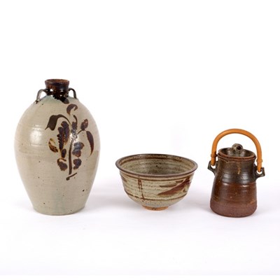 Lot 233 - A stoneware bottle vase with twin lug handles...