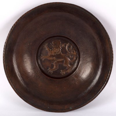 Lot 269 - Hugh Wallis (1871-1943), a copper charger,...