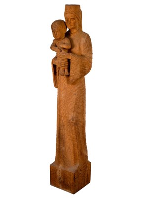 Lot 285 - Style of Eric Gill, a life-sized adzed wood...