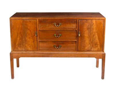 Lot 309 - Gordon Russell, British 1920s, a walnut...