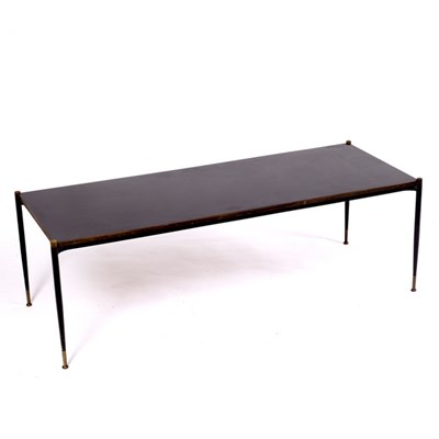 Lot 339 - A retro vintage coffee table, the ebonised top...