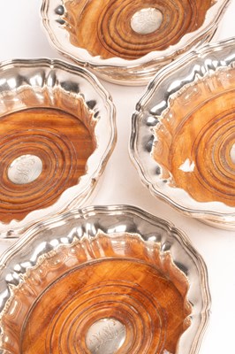 Lot 135 - A set of four Victorian silver wine coasters