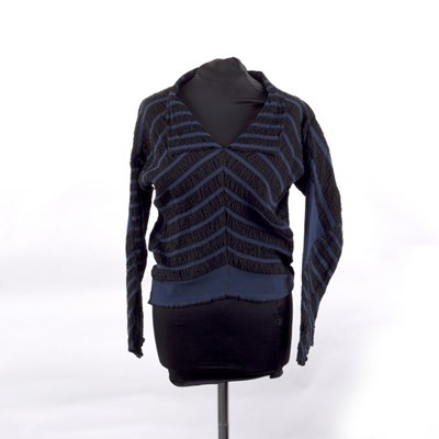 Lot 644 - An Issey Miyake blue and black striped...