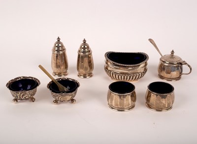 Lot 5 - An Art Deco five-piece silver cruet set,...