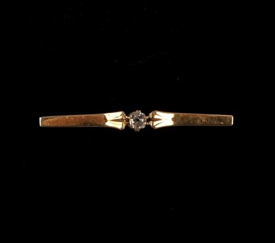 Lot 225 - A diamond tie pin, the old cut stone of...