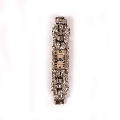 Lot 244 - A lady's Art Deco diamond set cocktail...