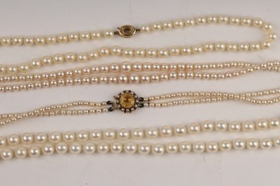 Lot 186 - A two-row cultured pearl necklace, the...