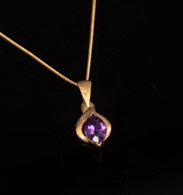 Lot 12 - A 9ct yellow gold and amethyst bracelet, set...