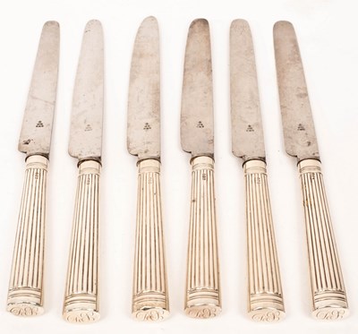 Lot 123 - A set of six George III silver handled knives,...