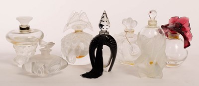 Lot 113 - Lalique, seven scent bottles and stoppers,...