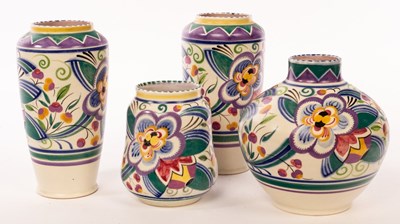 Lot 149 - Poole Pottery, a pair of vases, Lenny the Lion...