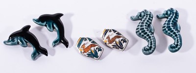 Lot 158 - Poole Pottery, six decorative brooches,...
