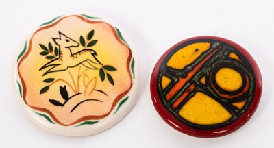 Lot 160 - Poole Pottery, a circular brooch in Truda...