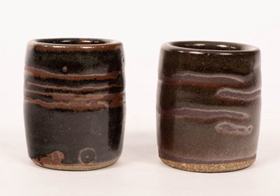 Lot 230 - Leach pottery, two yunomi, tenmoku wax resist...