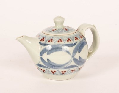Lot 239 - Derek Emms (1929-2004), a porcelain teapot...