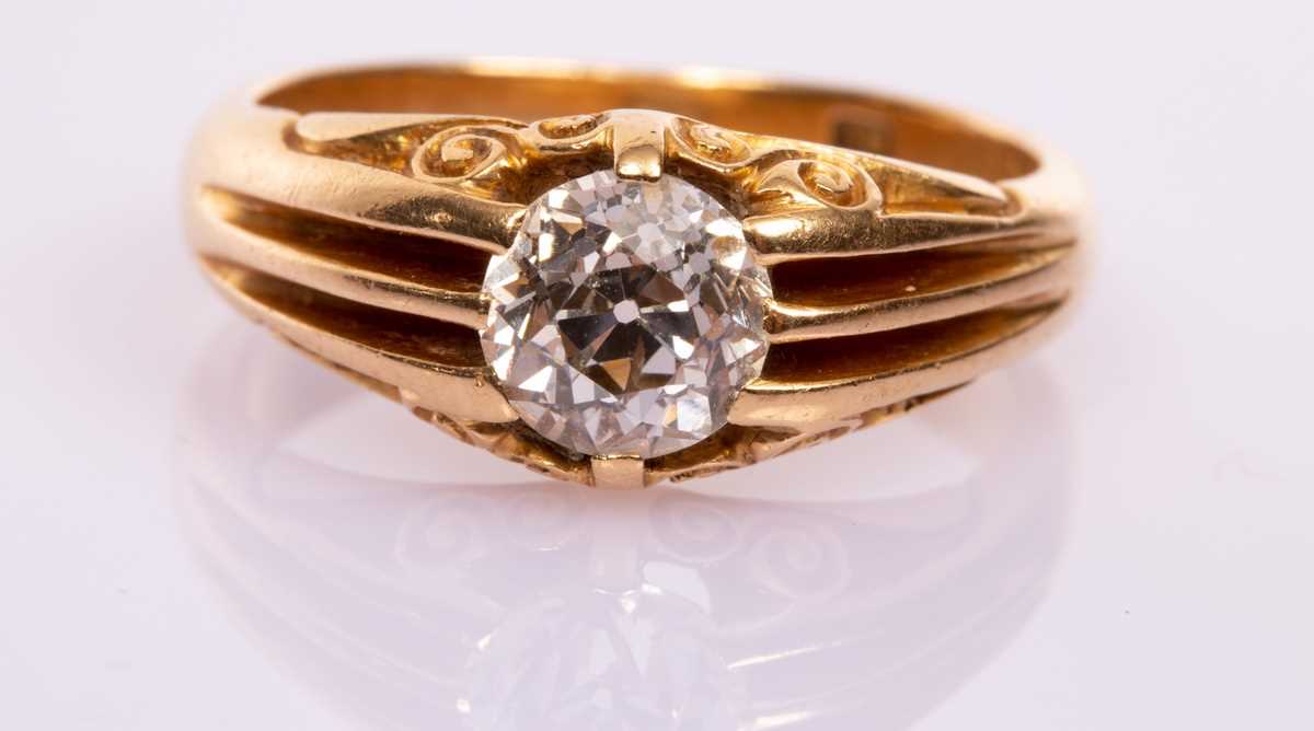 Lot 15 - A Victorian diamond solitaire ring, the old...