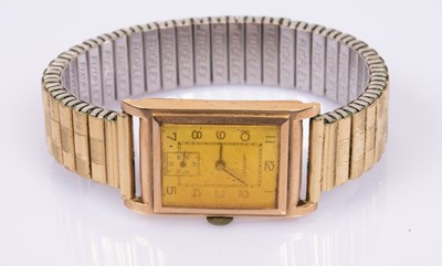 Lot 108 - A gentleman's 9ct gold cased Waverly tank...
