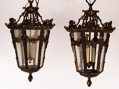 Lot 810 - A pair of hexagonal tapering lanterns, the...