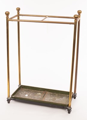 Lot 919 - A brass two-division stick stand with turned...