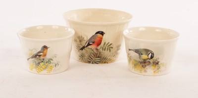 Lot 41 - Three Royal Worcester soufflé pots painted a...