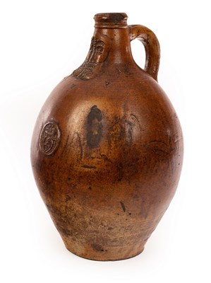 Lot 71 - A large German stoneware Bartmannkrug with...