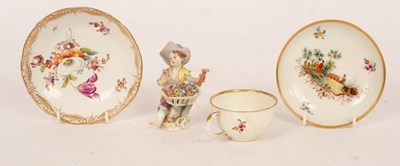 Lot 78 - A Meissen figure of a putto dressed as a...