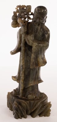 Lot 93 - A Chinese jade figure of Shoulao, early 20th...