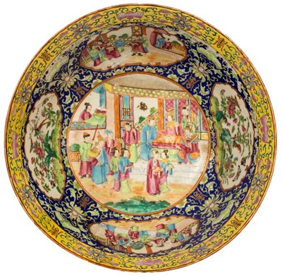 Lot 97 - A Cantonese famille rose punch bowl, Qing...