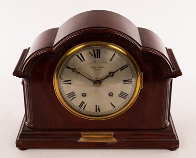Lot 373 - An Edwardian mahogany eight-day mantel clock...